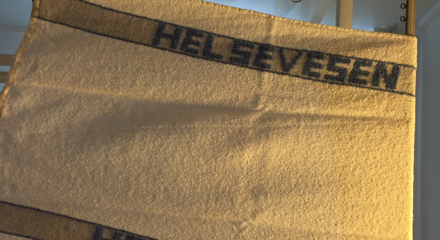 Bilde av håndkle med påskriften; helsevesen