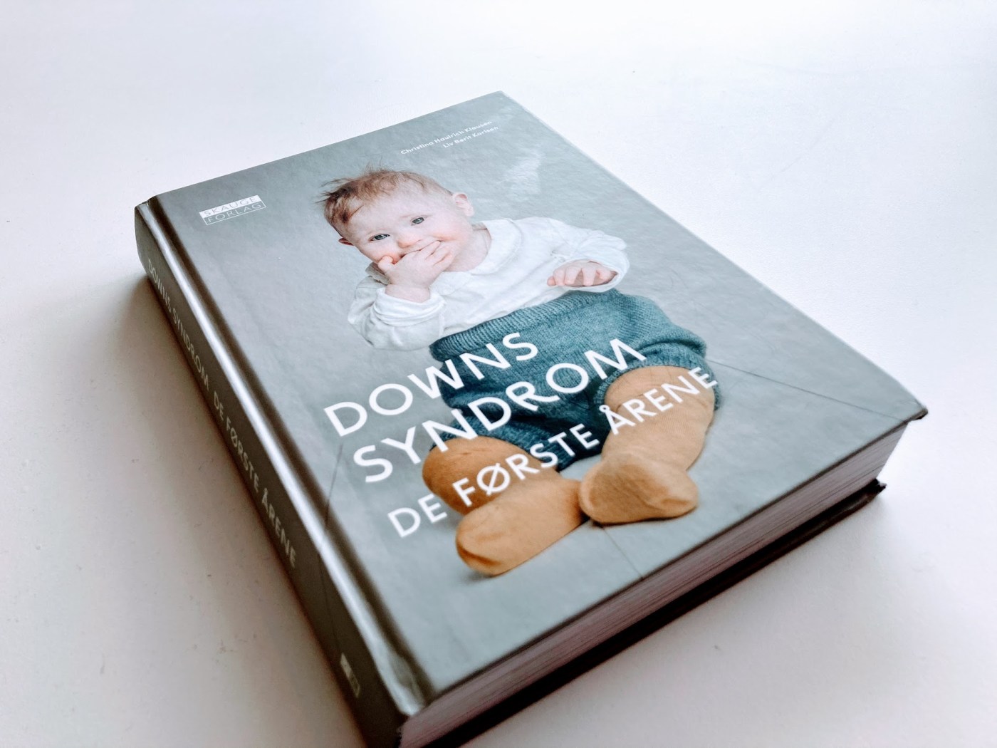 Bilde av boken Downs syndrom de første årene